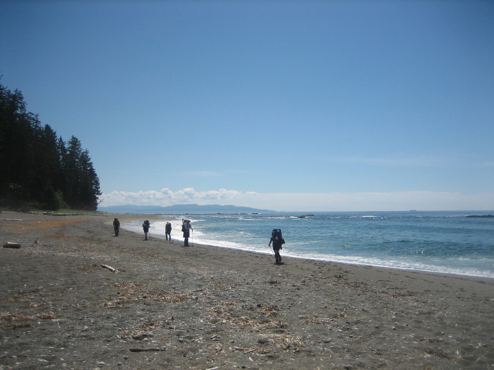 Hikers on the beach section of the West Coast Trail, Vancouver Island